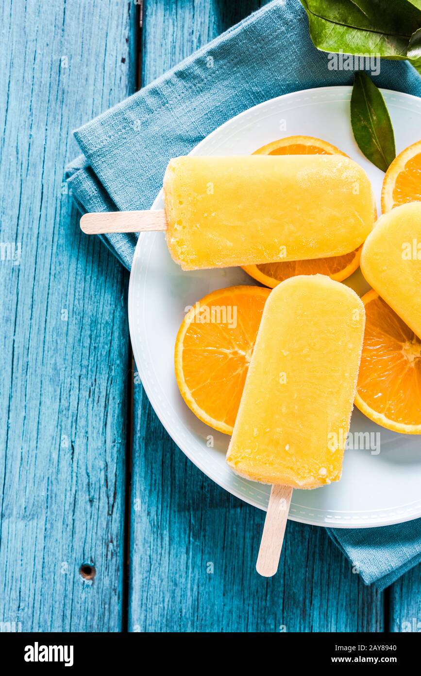 Healthy snack, orange natural popsicle Stock Photo