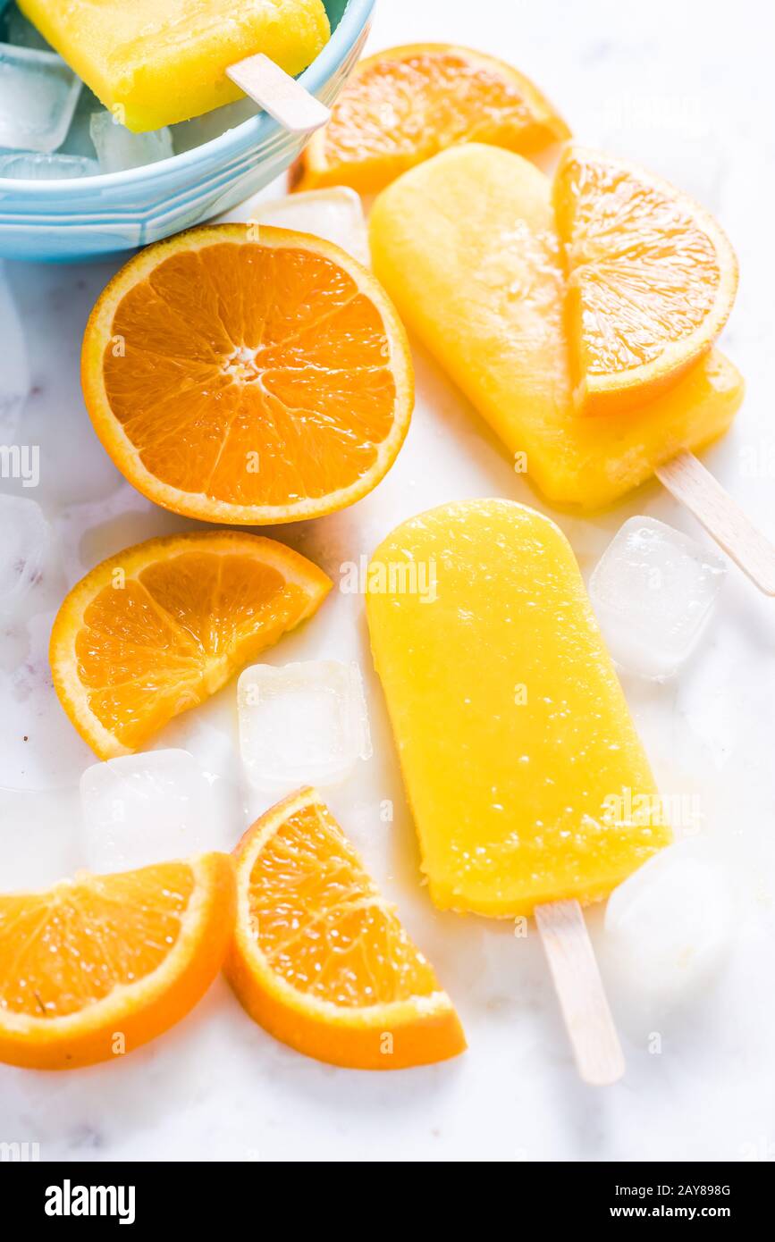 Homemade, natural orange ,refreshing summer popsicle Stock Photo