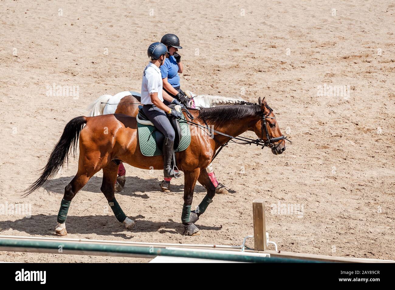 10 JULY 2018, BARCELONA, SPAIN Woman riding a horse at the race track. Equestrian sport and