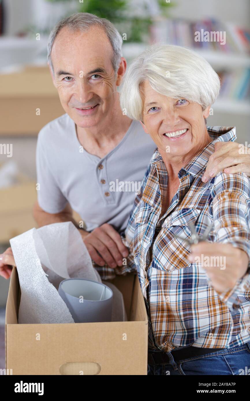senior couple showing new houses key Stock Photo - Alamy
