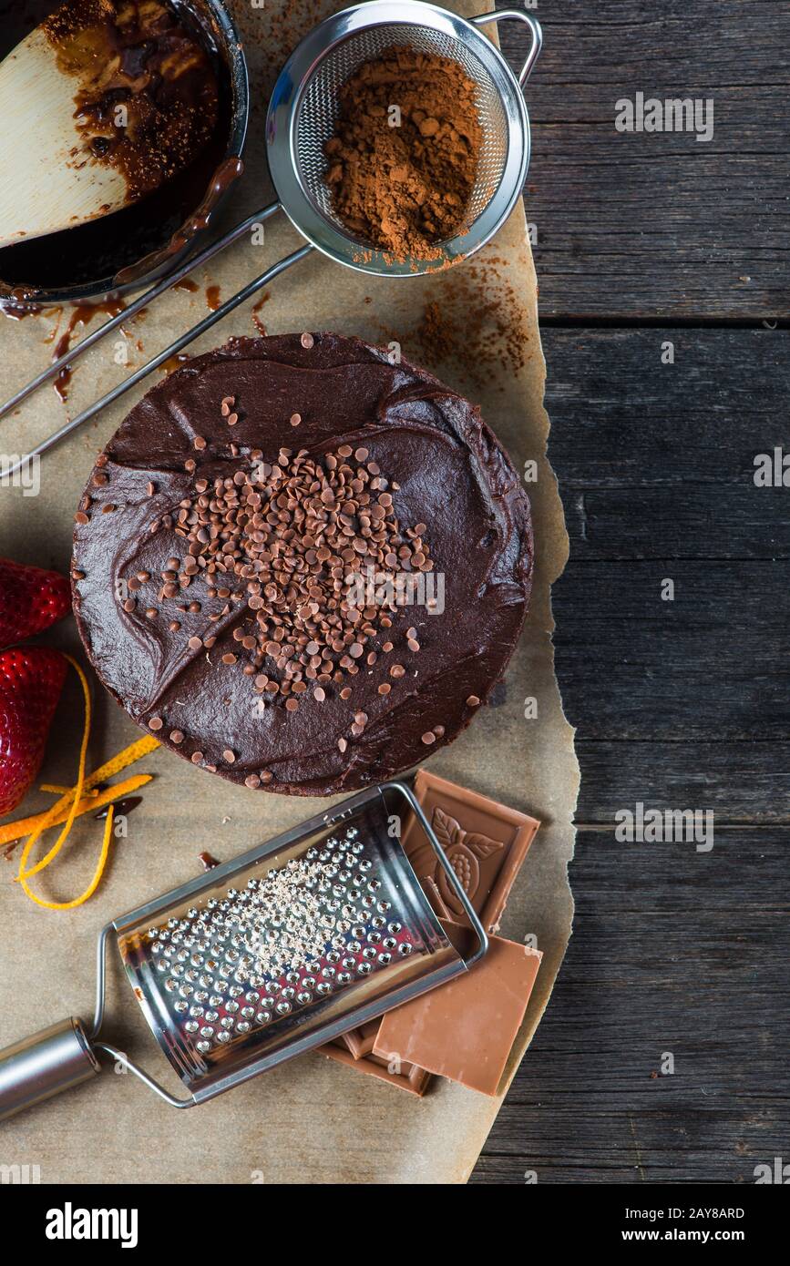 homemade chocolate cake recipe border background from above Stock Photo
