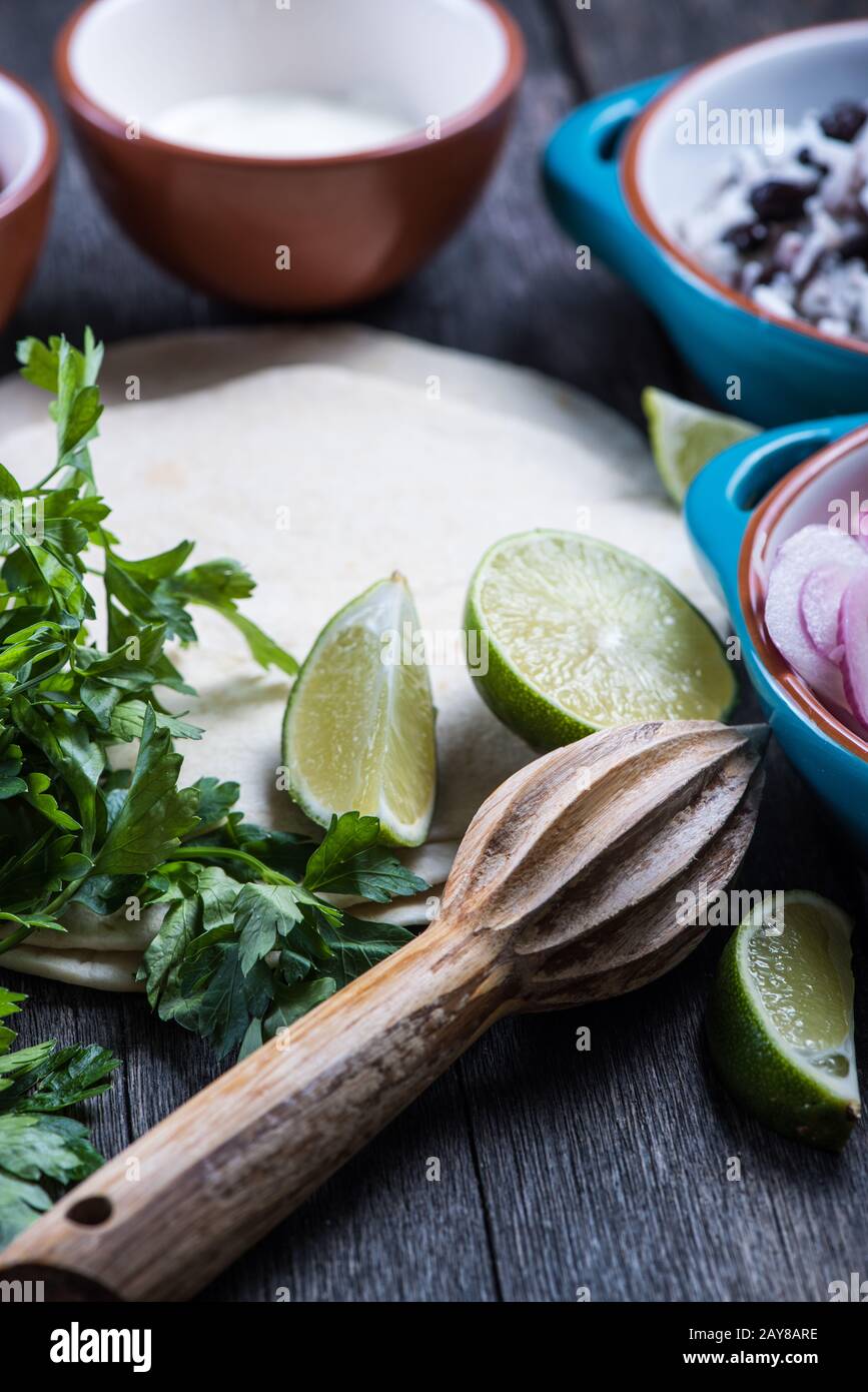 Making traditional mexican burritos with pulled beef Stock Photo