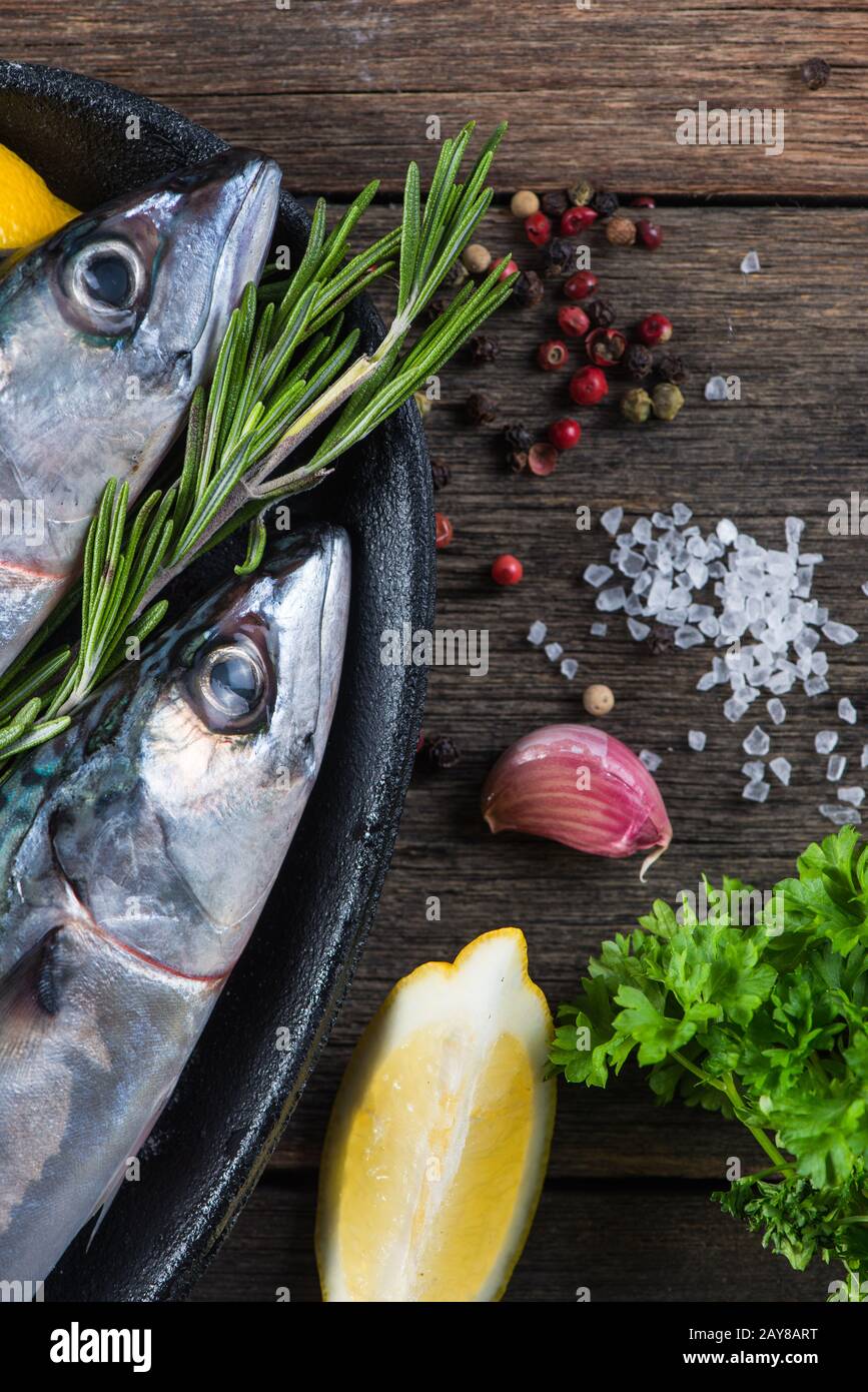 Food background of fresh fish with herbs,cooking concept Stock Photo