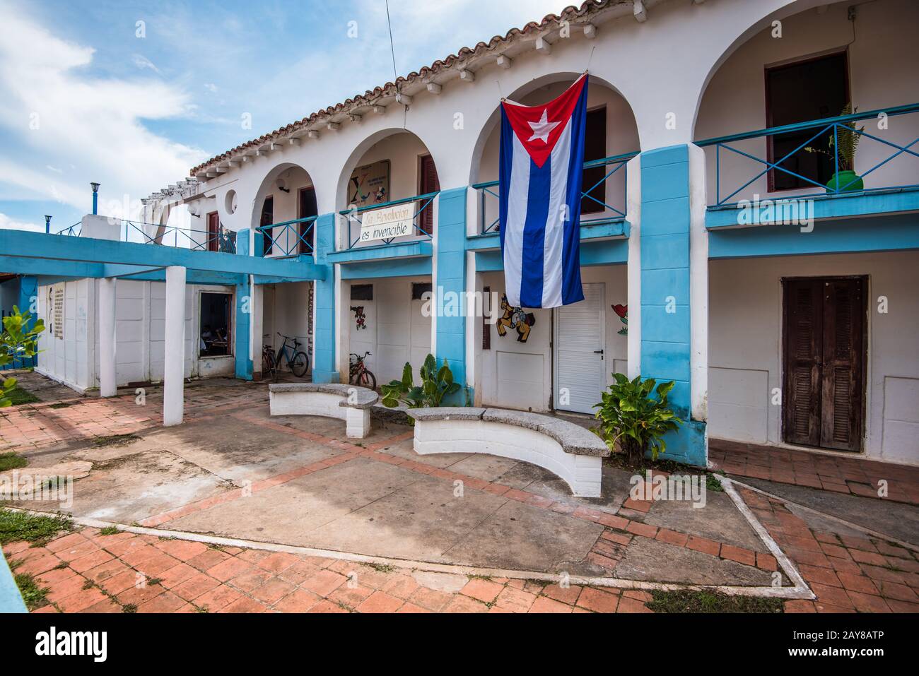 Cuban bandera or flag on colonial building Stock Photo
