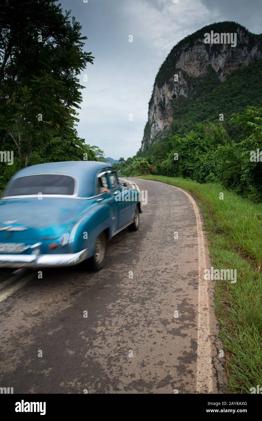 Old american car drive in Cuba rural village Stock Photo