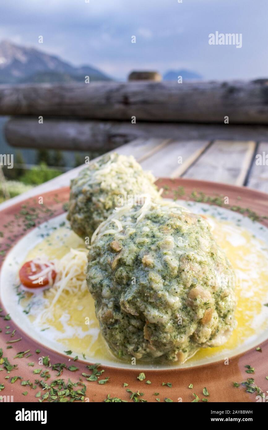Austrian spinach dumplings on a table Stock Photo