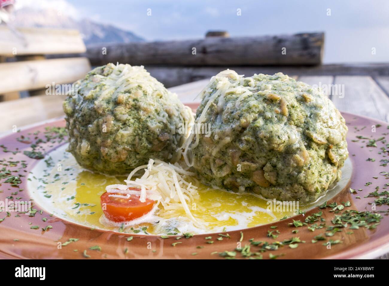 Austrian spinach dumplings on a table Stock Photo