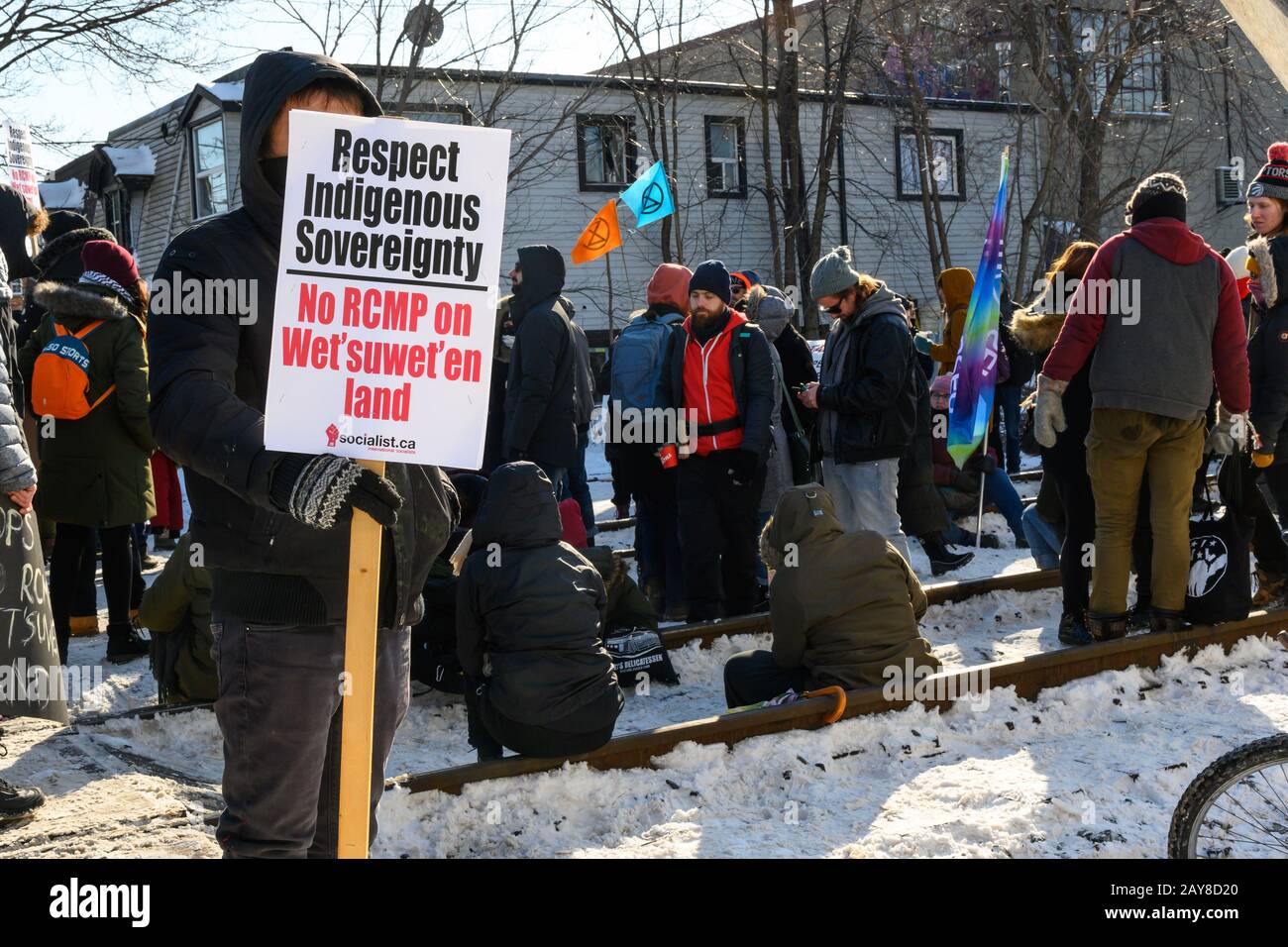 Anti-pipeline protesters organized by Extinction Rebellion block train tracks in solidarity with the Wet'suwet'en people. Stock Photo