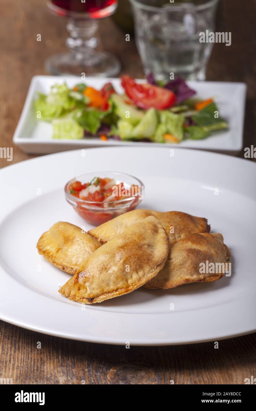 homemade empanadas with tomato salsa Stock Photo Alamy