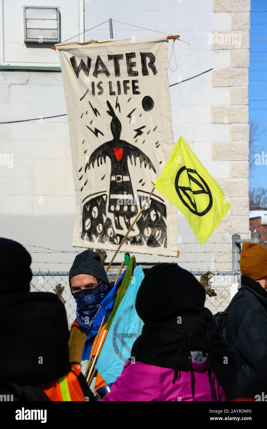Anti-pipeline protesters with Extinction Rebellion block train tracks as part of the Shut Down Canada protests in solidarity with the Wet'suwet'en. Stock Photo
