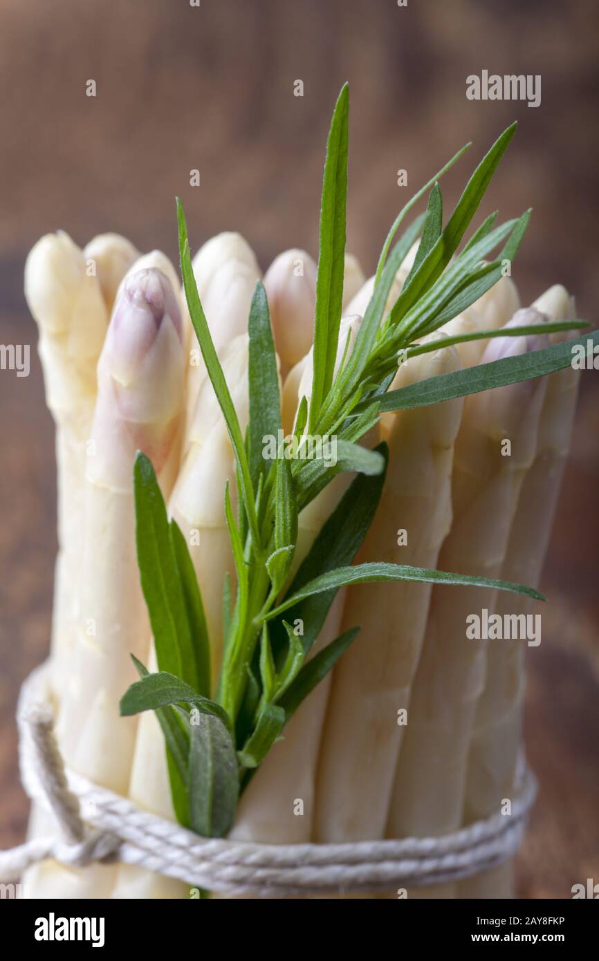 white asparagus on dark wood Stock Photo
