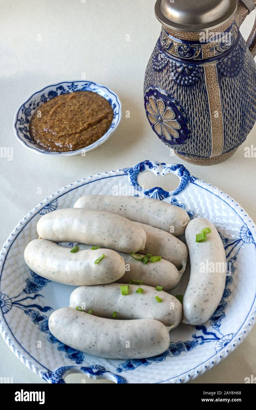Munich veal sausages (weisswursts) and jar Stock Photo