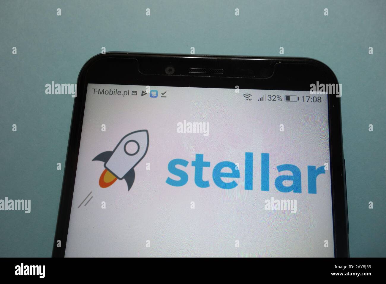 Stellar (XLM) cryptocurrency logo displayed on smartphone Stock Photo