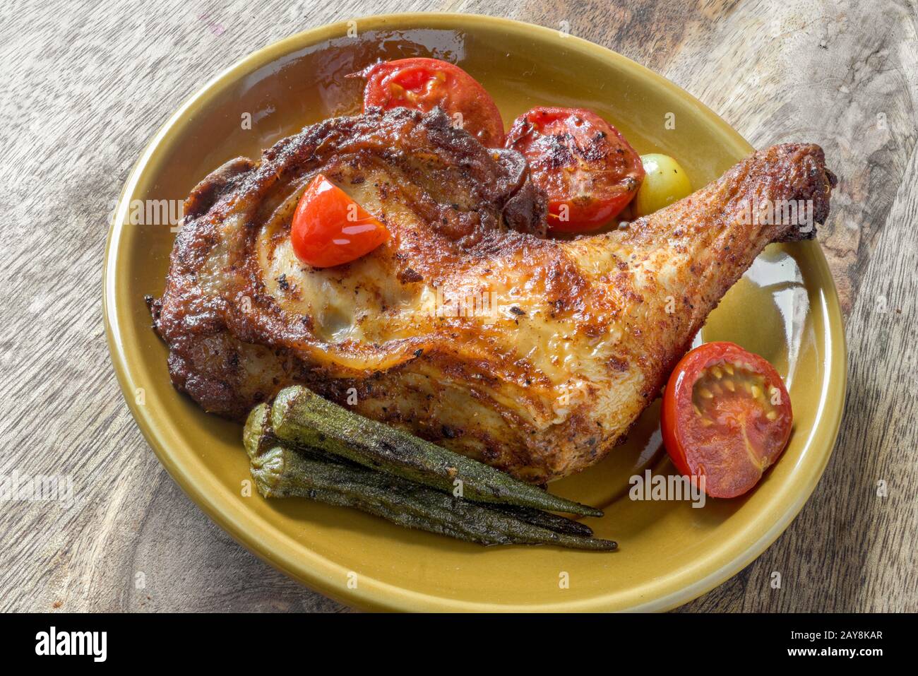 Roasted chicken drumstick Stock Photo