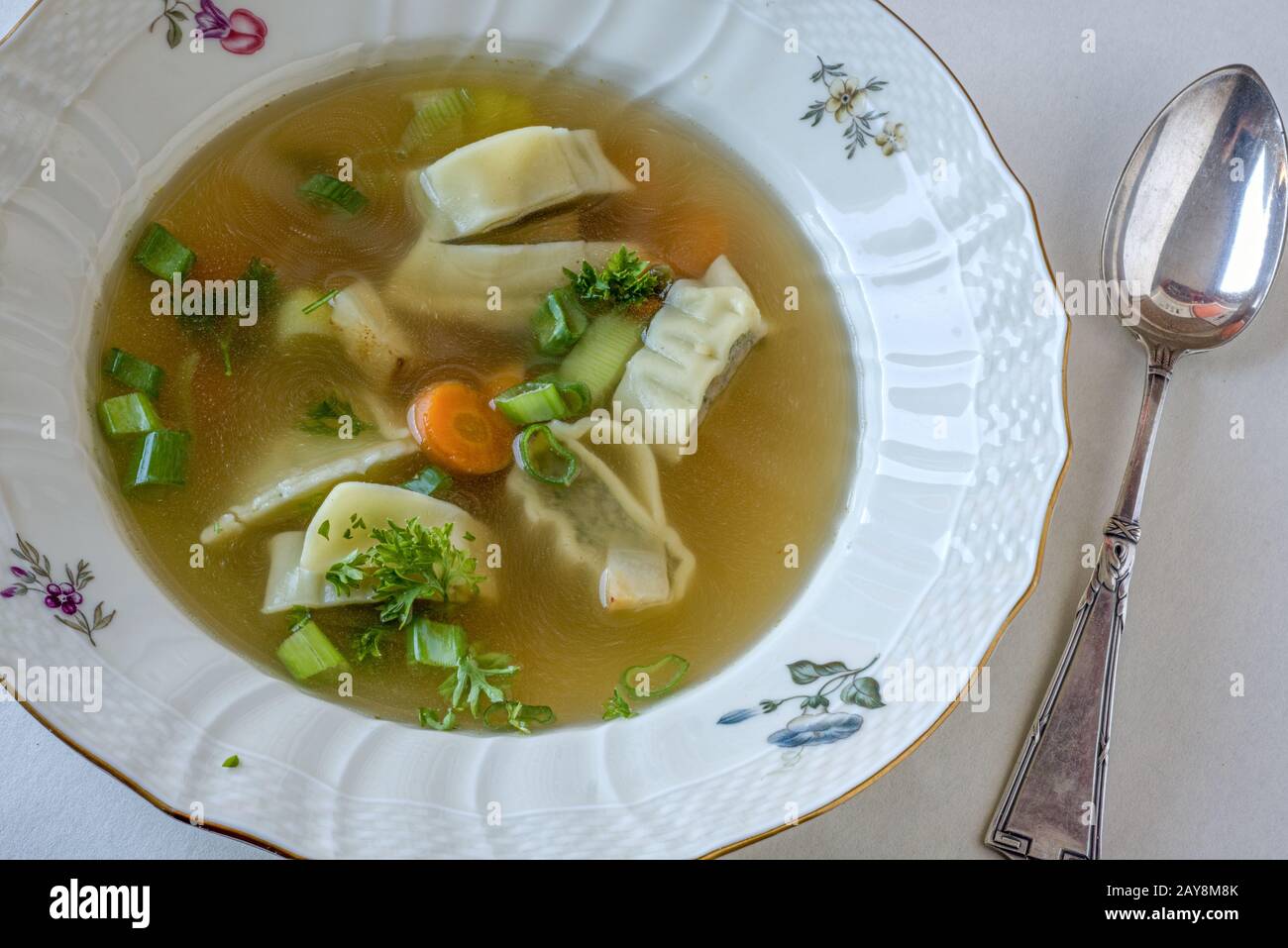 Swabian dumpling soup Stock Photo