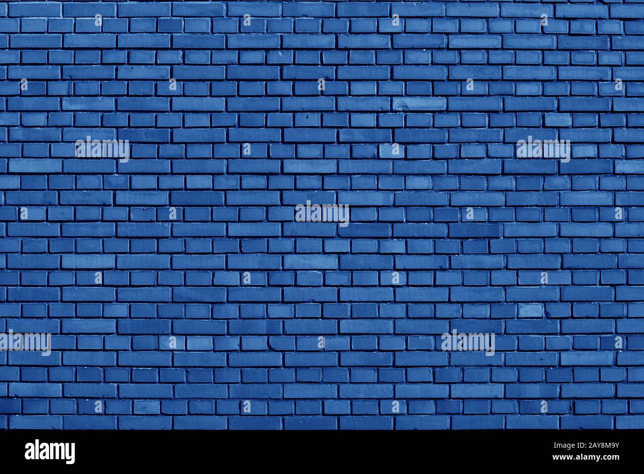 Nebulas Blue colored brick wall background Stock Photo