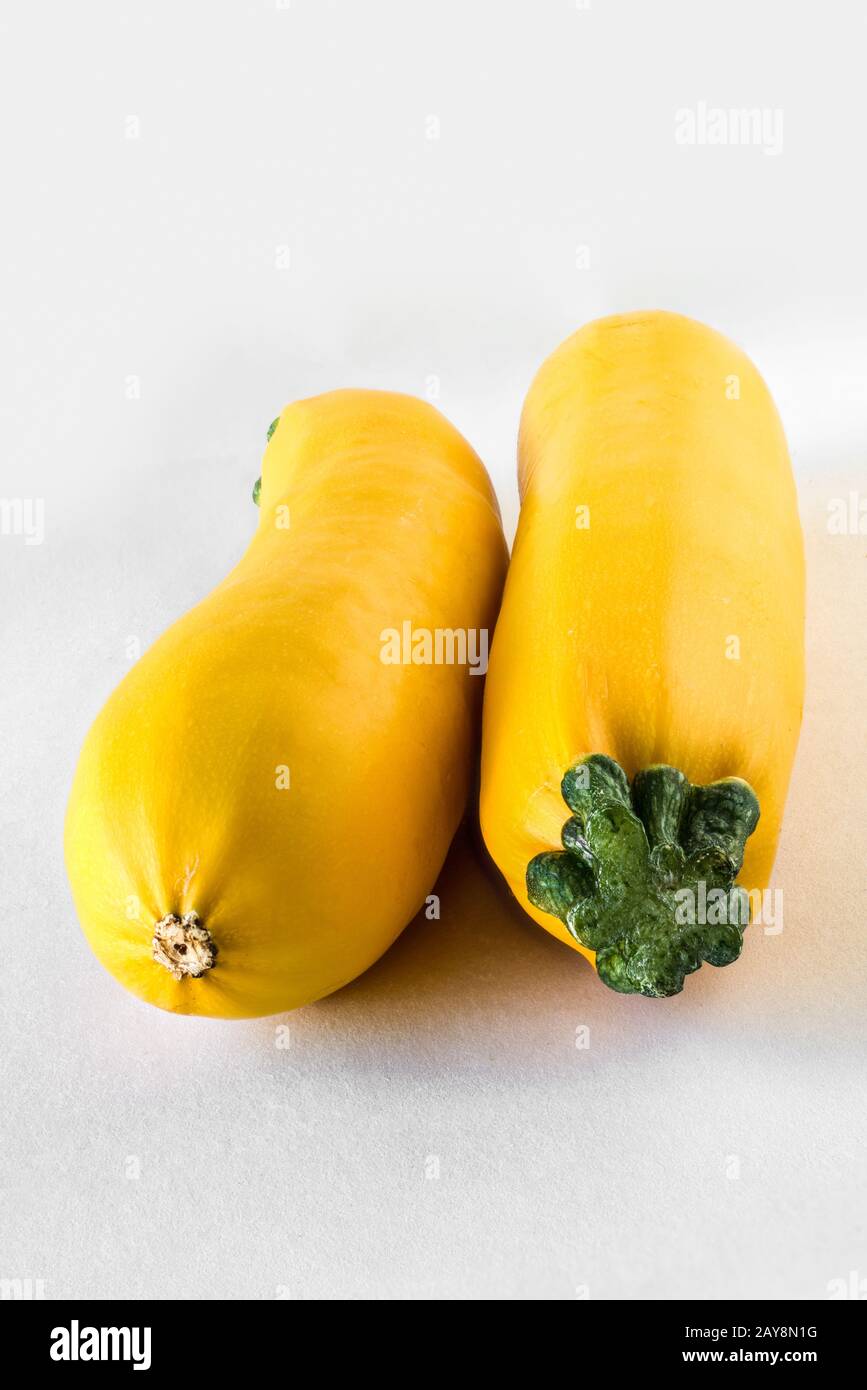 Yellow zucchini on a white background Stock Photo Alamy