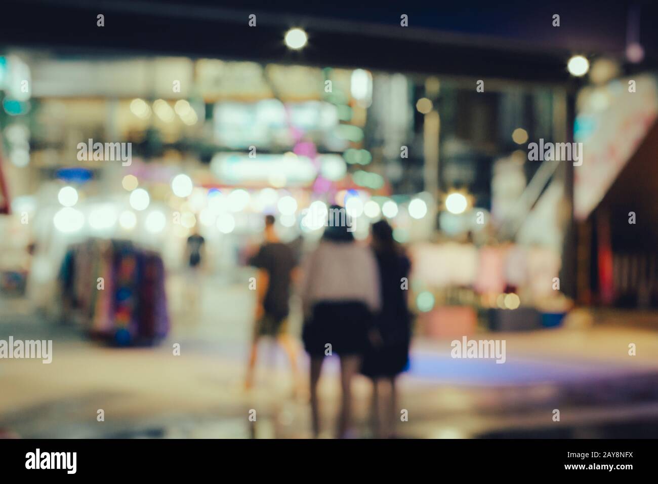 Abstract blurred people walking in shopping center Stock Photo - Alamy