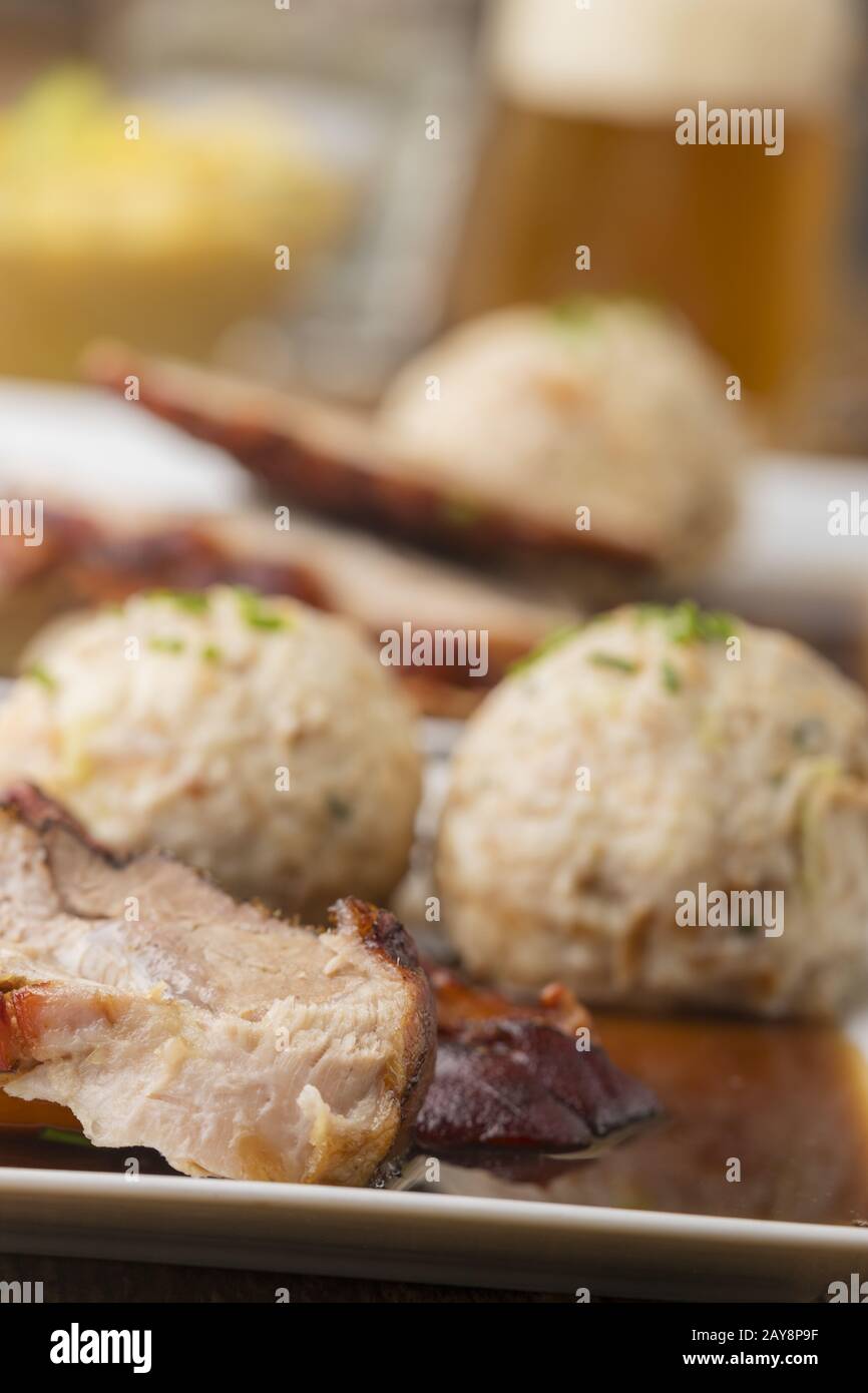 Bavarian roast pork with dumplings Stock Photo Alamy