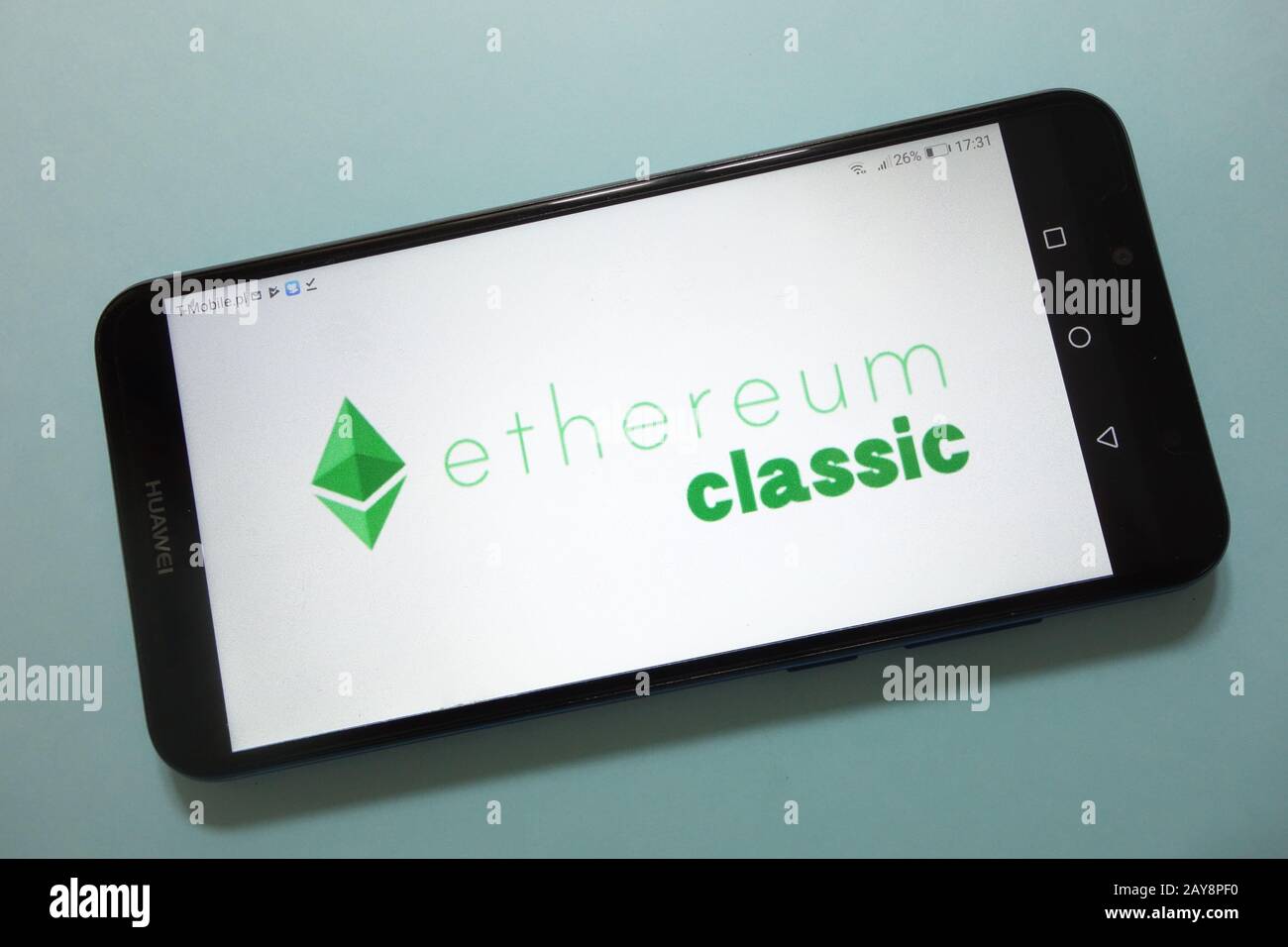 Ethereum Classic (ETC) cryptocurrency logo displayed on smartphone Stock Photo