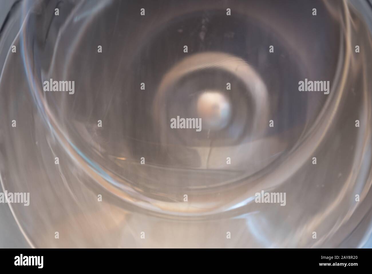 blurred porthole of a washing machine in motion - long exposure Stock Photo