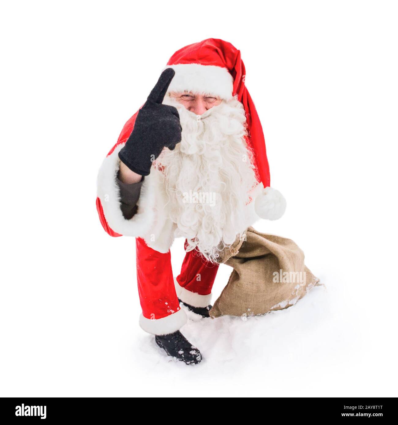 Santa Claus pointing with his index finger up. Isolated on white background. Stock Photo