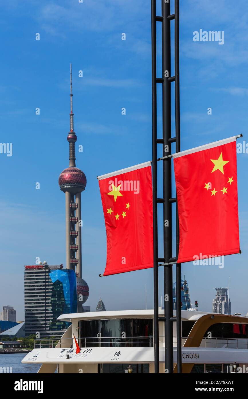 Shanghai, China - May 23, 2018: Chinese flag and modern Pudong skyline in Shanghai, China Stock Photo