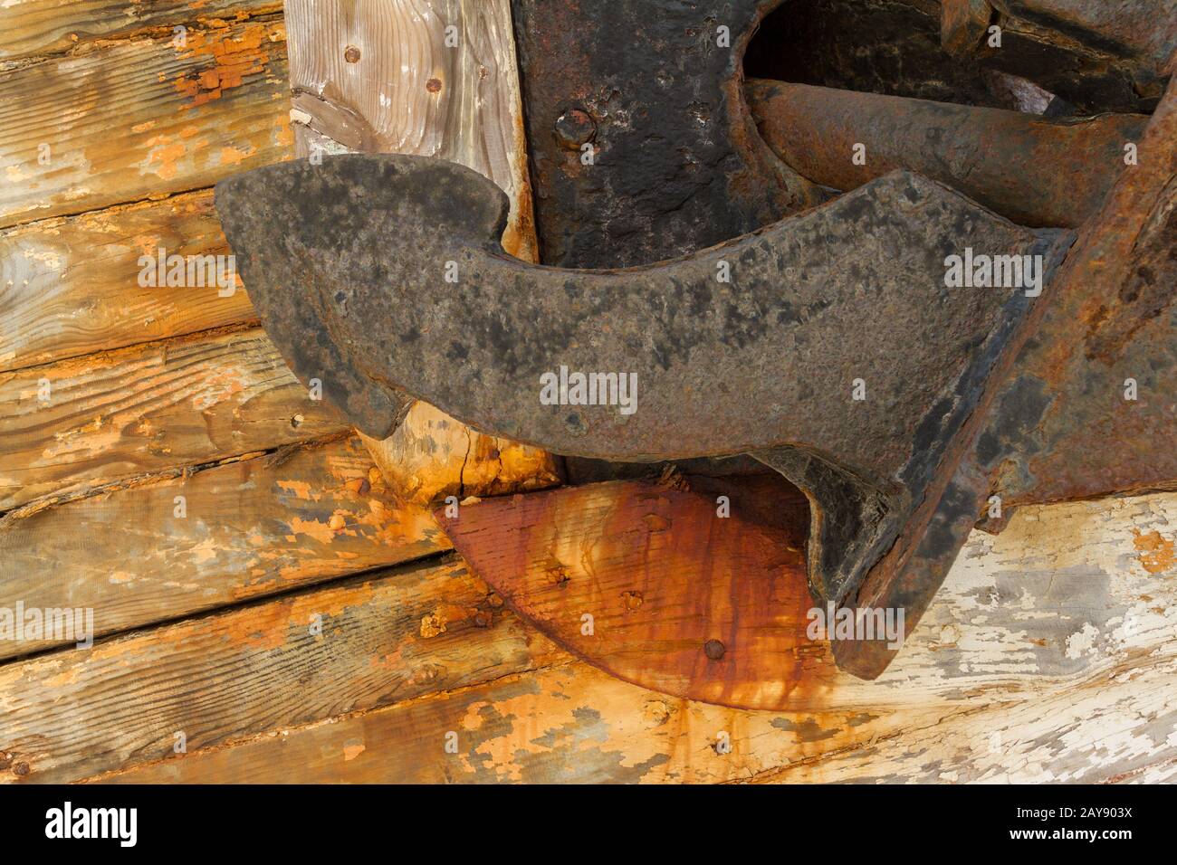 Anchor on Derelict Wooden Fishing Boat Wreck closeup Stock Photo