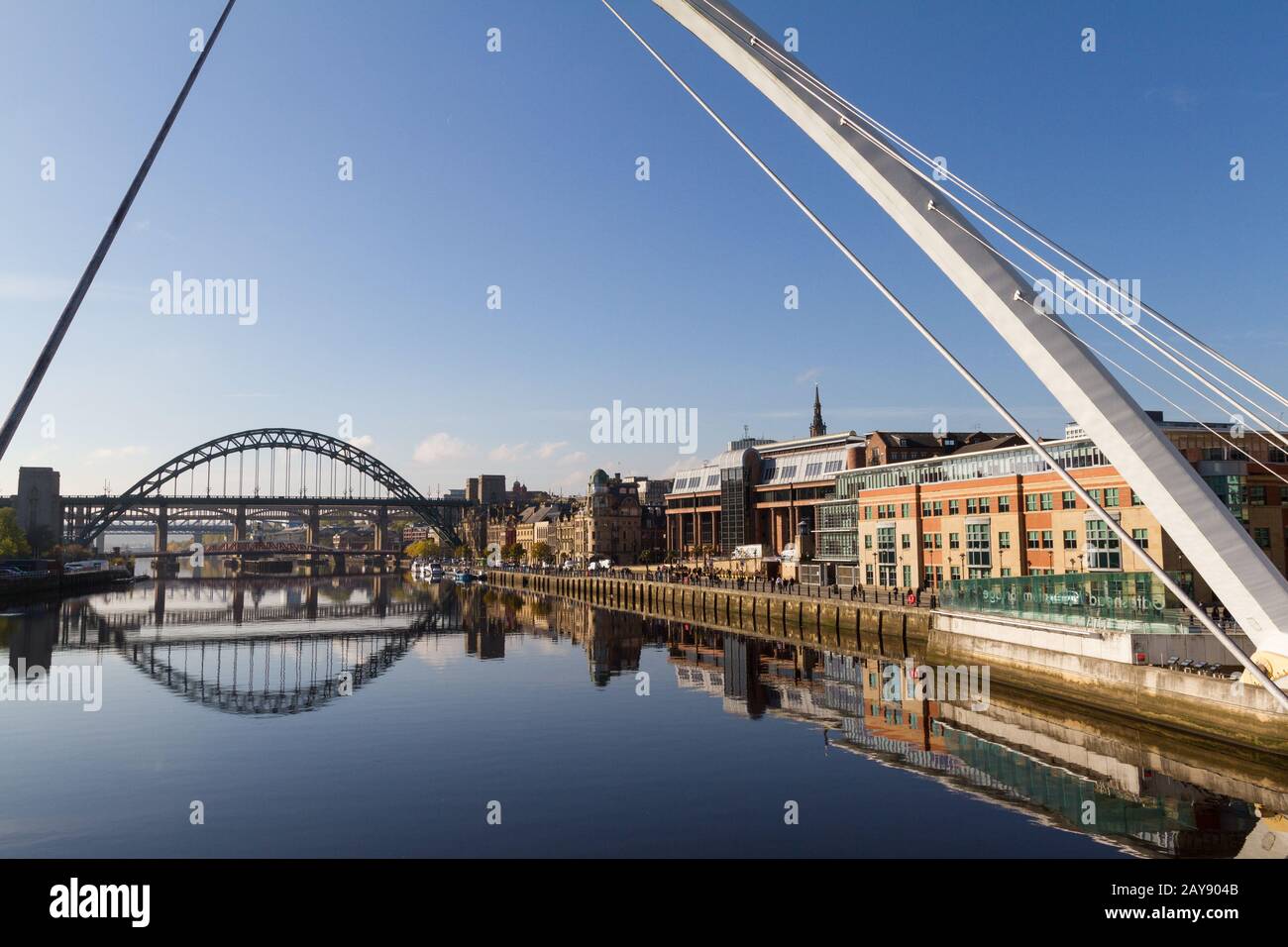 Newcastle Gateshead Quayside with Millenium and Tyne Bridges in view Stock Photo