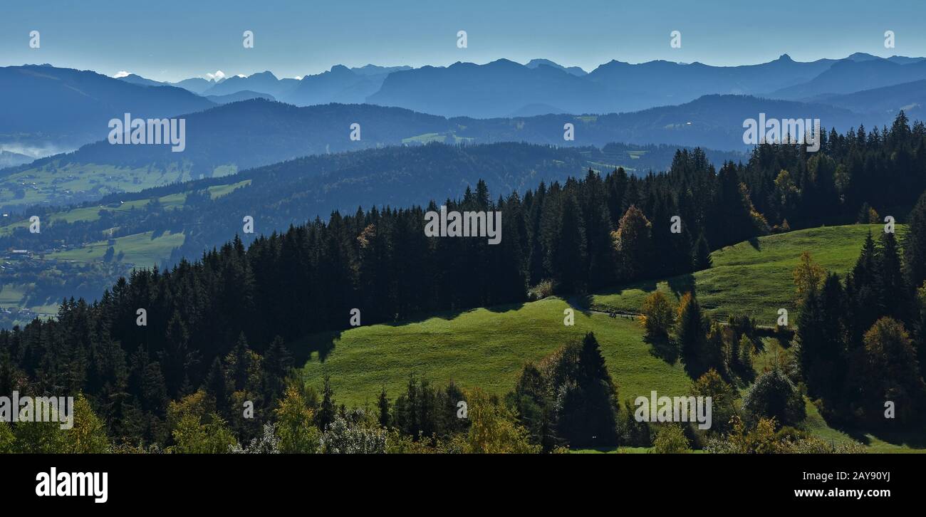 view from the mountain Pfänder near Bregenz at Lake Constance to the alps in the morning light Stock Photo
