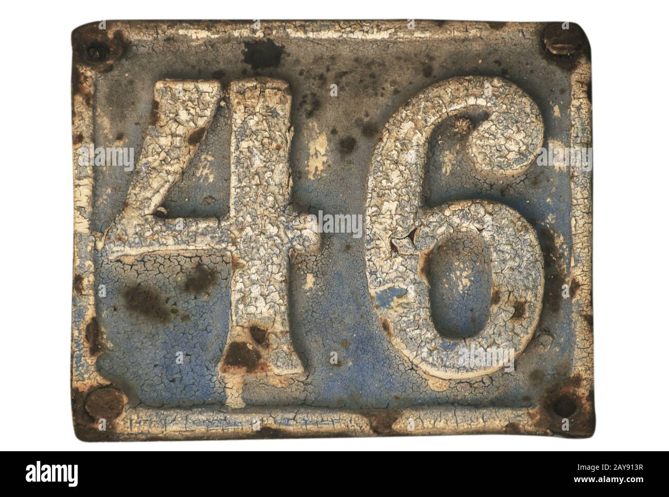 Old retro weathered cast iron plate with street number 46 closeup isolated on white background Stock Photo
