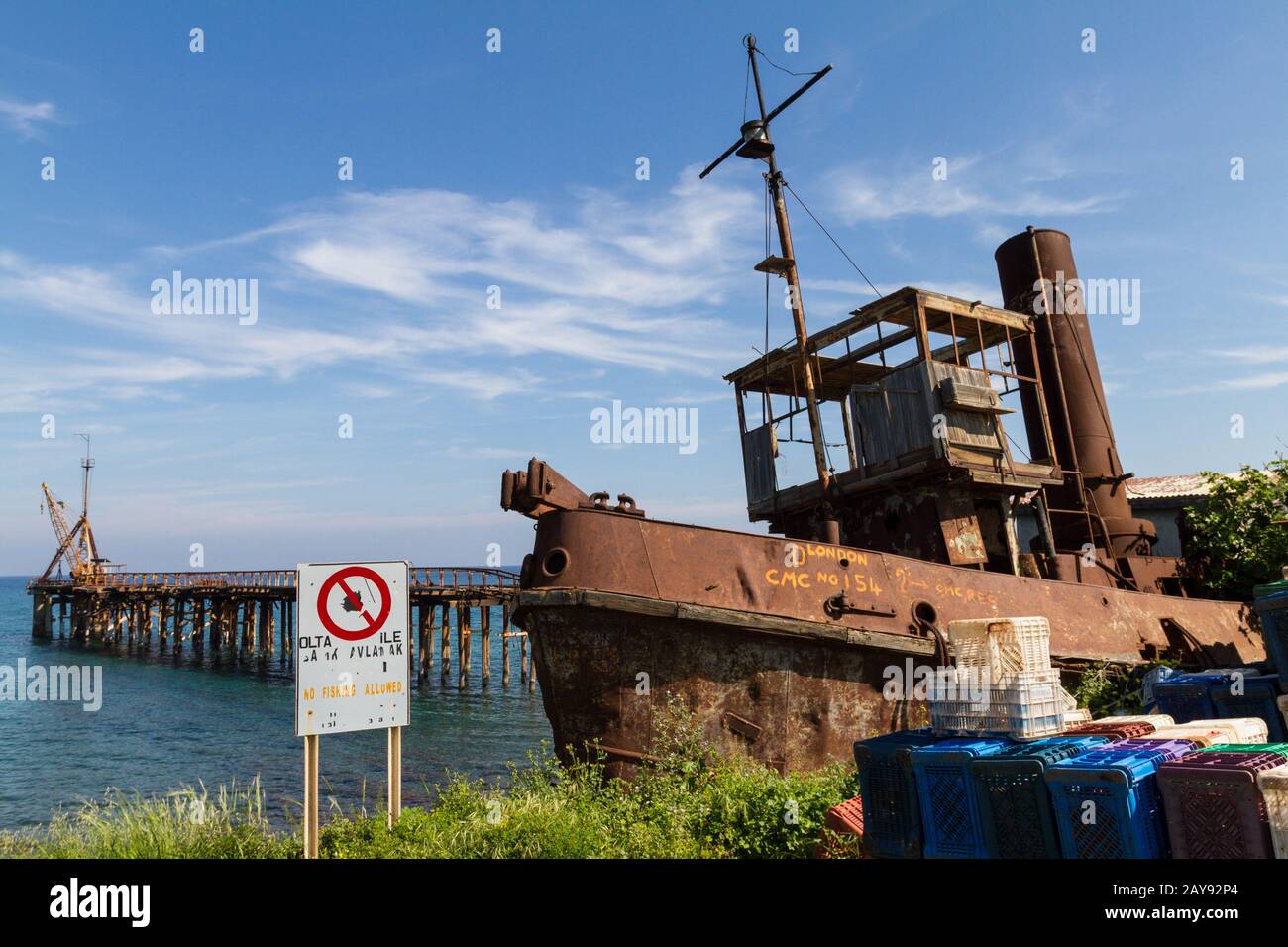 Derelict Steam Boat and Pier at Xeros, Cyprus Stock Photo