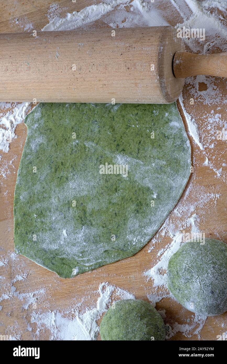 Dough for Chinese spinach noodles Stock Photo