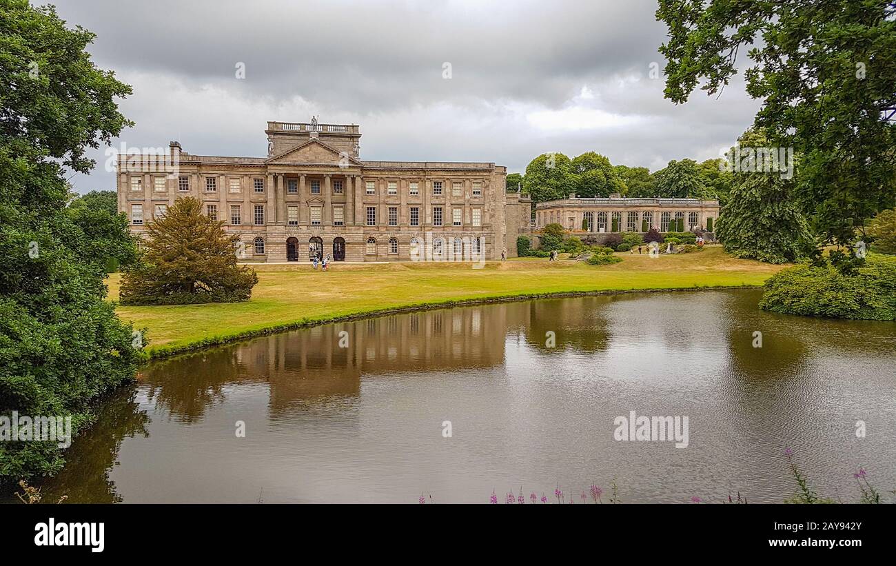 Lyme Hall and its pond inside Lyme Park in Cheshire, England. Stock Photo