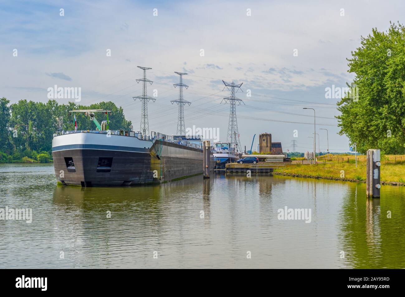 River boat at the mooring on the Maas. Stock Photo