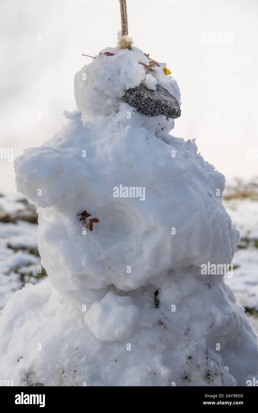 funny snowman - children's joy over snow Stock Photo