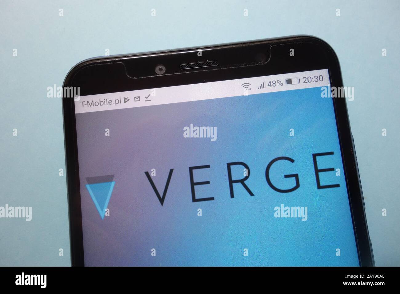 Verge (XVG) cryptocurrency logo displayed on smartphone Stock Photo