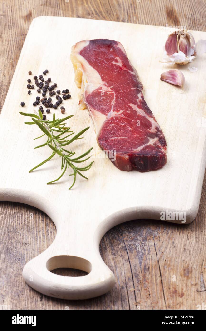 Dry-age steak on wood Stock Photo