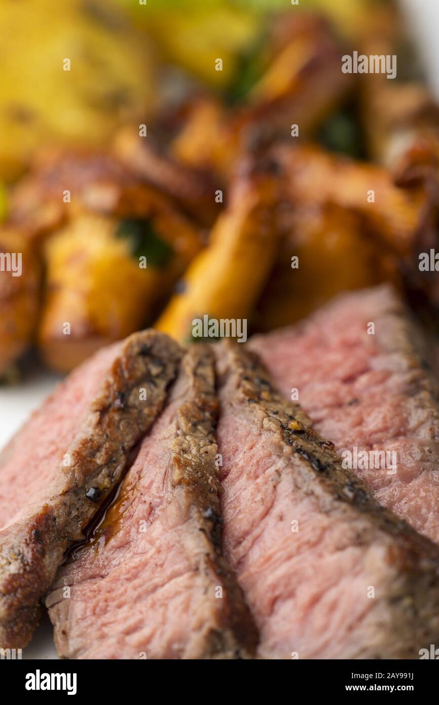 Steak slices with chanterelles Stock Photo Alamy