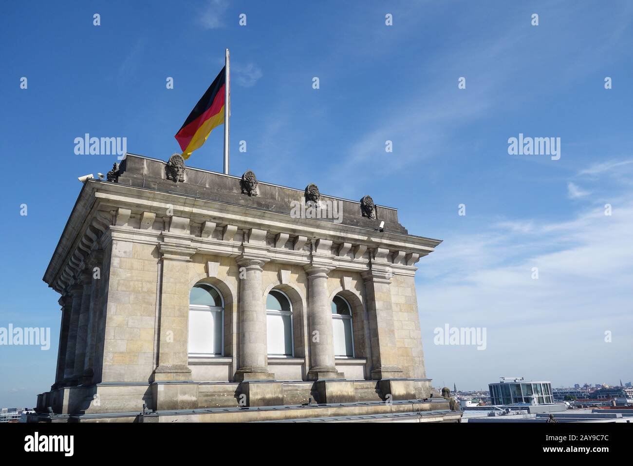 The Reichstag with German flag Stock Photo