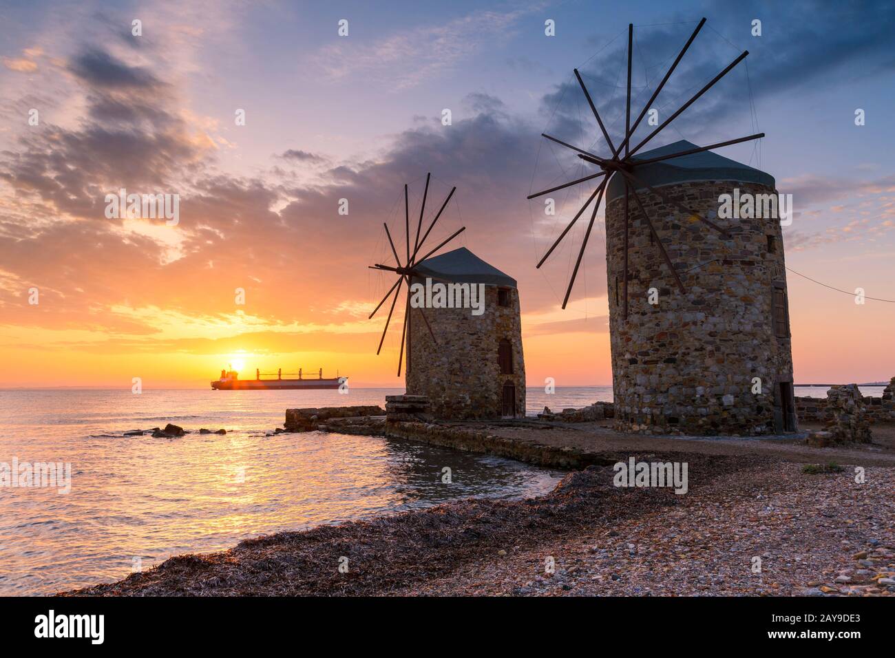 Sunrise image of the iconic windmills in Chios town. Stock Photo