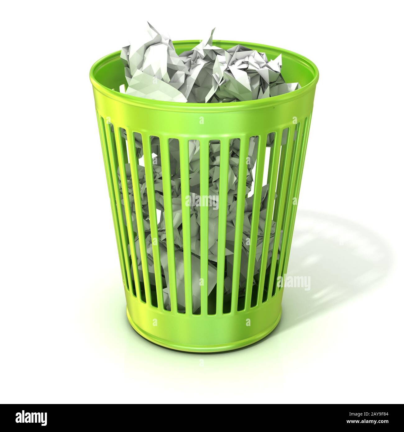 Green trash bin, full of crumpled paper Stock Photo Alamy