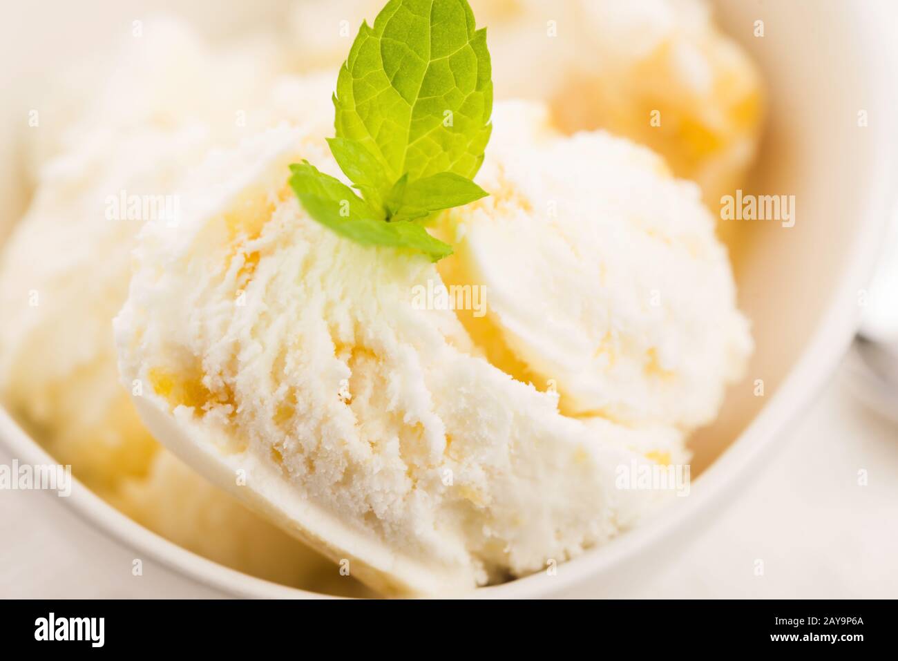 Vanilla Ice Cream with Mint in bowl Organic product Stock Photo - Alamy