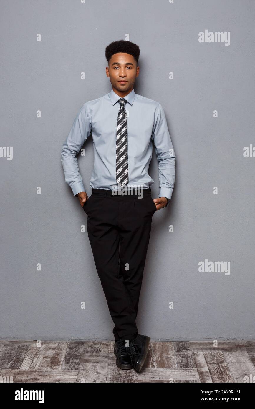 Business Concept - Full length portrait of confident african american ...