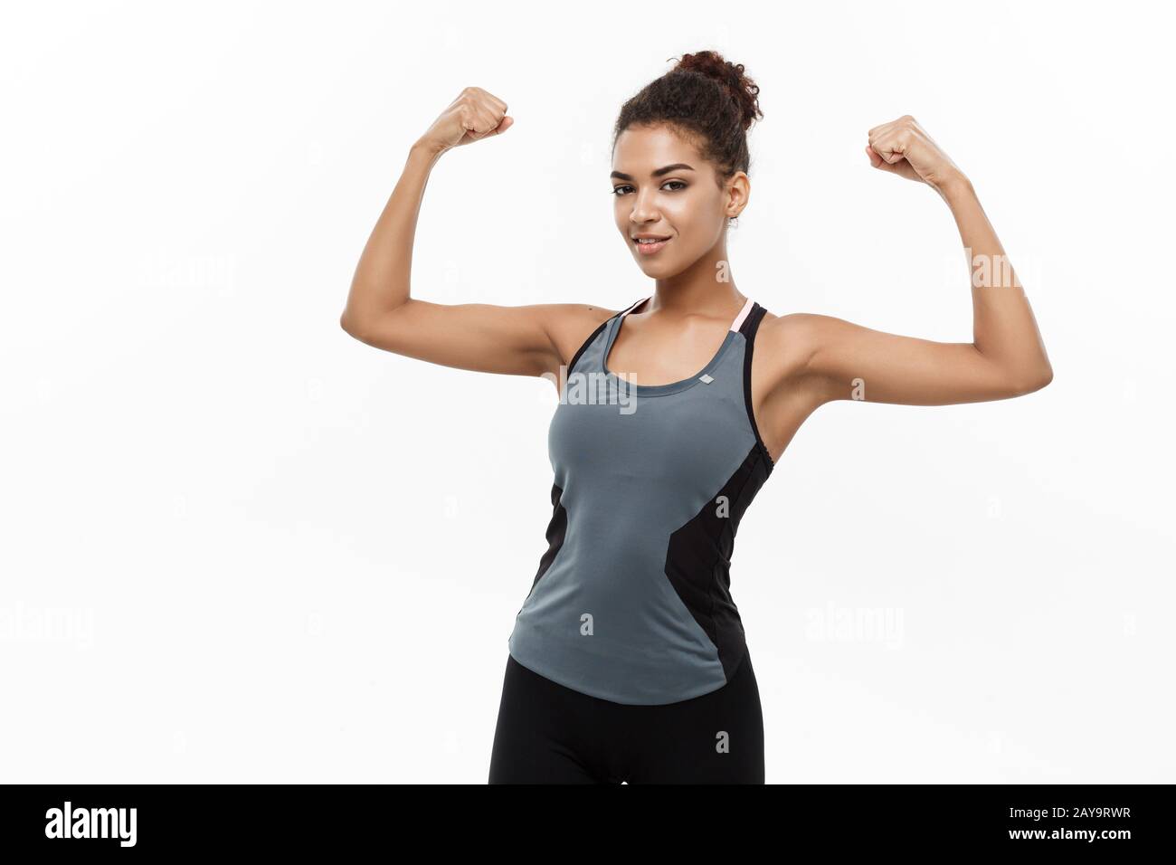 African american woman flexing bicep hi-res stock photography and images -  Alamy