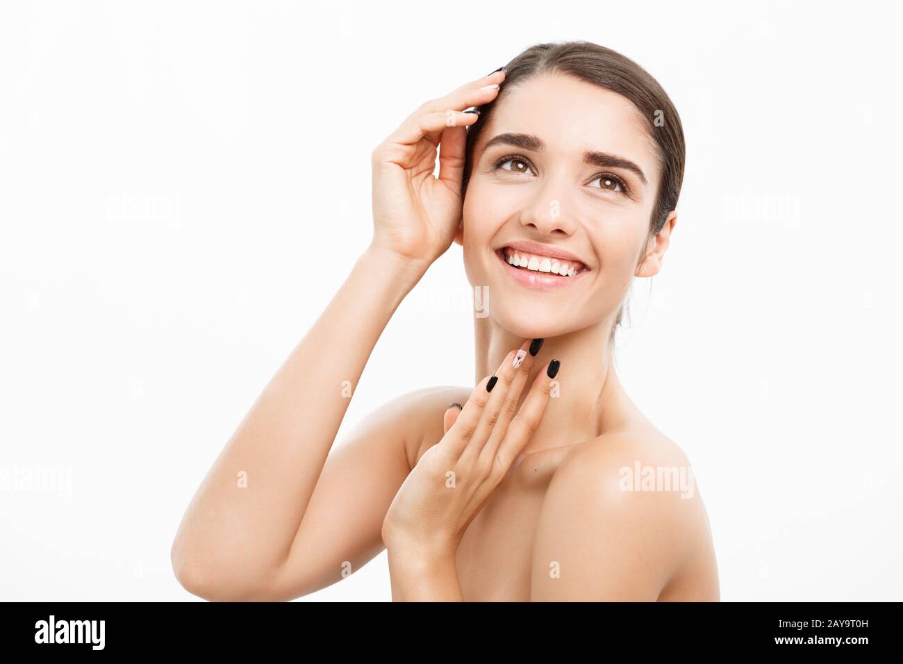 Beauty and Skin care concept - Close up Beautiful Young Woman touching ...