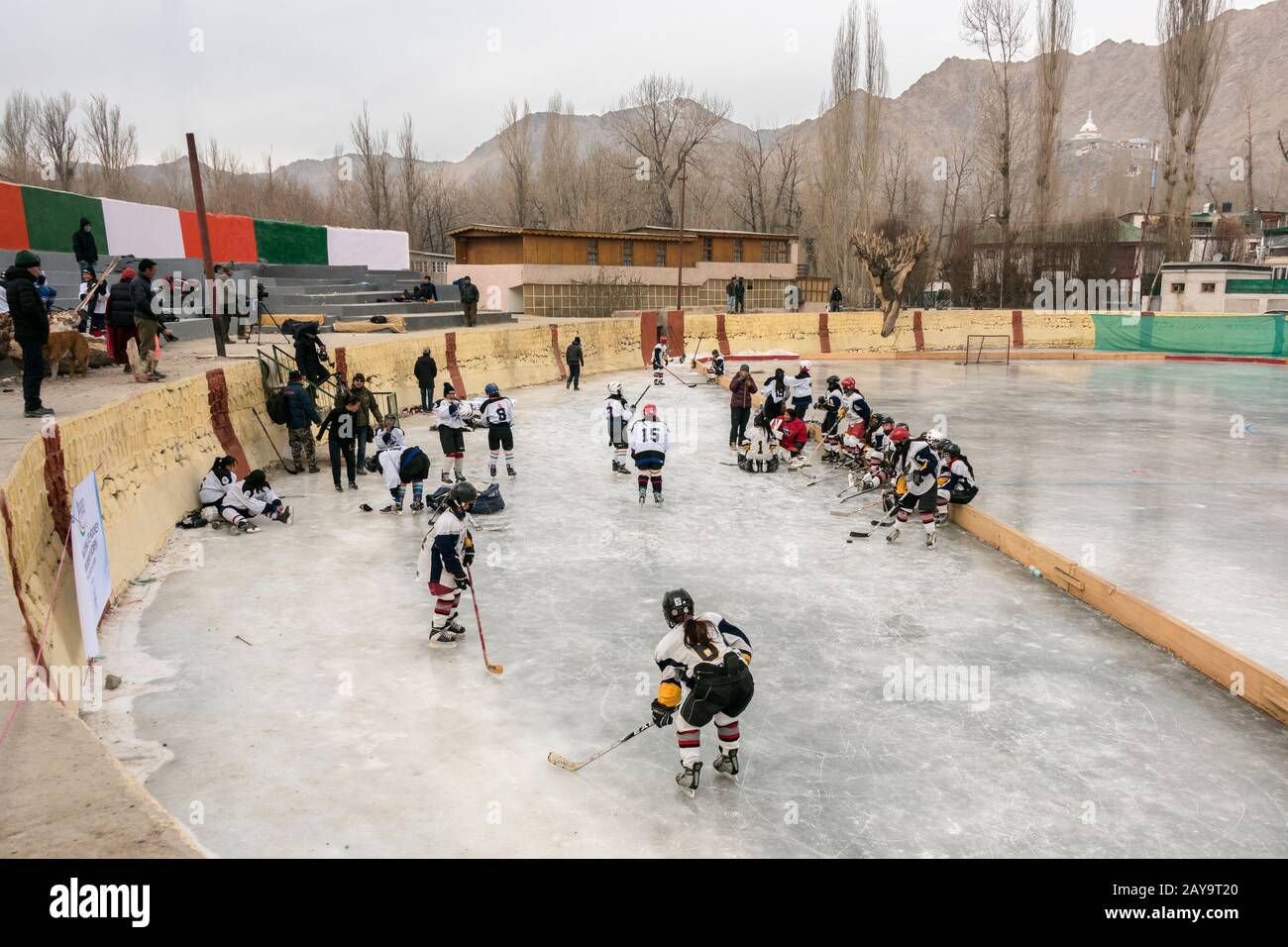 Ladakh women getting ready for championship hockey game against Delhi, Leh, Ladakh, India Stock Photo