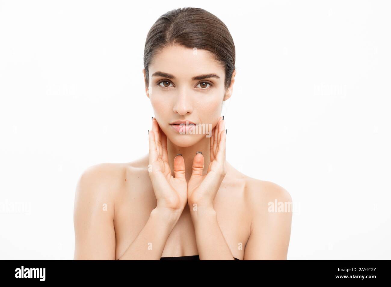 Beauty and Skin care concept - Close up Beautiful Young Woman touching ...
