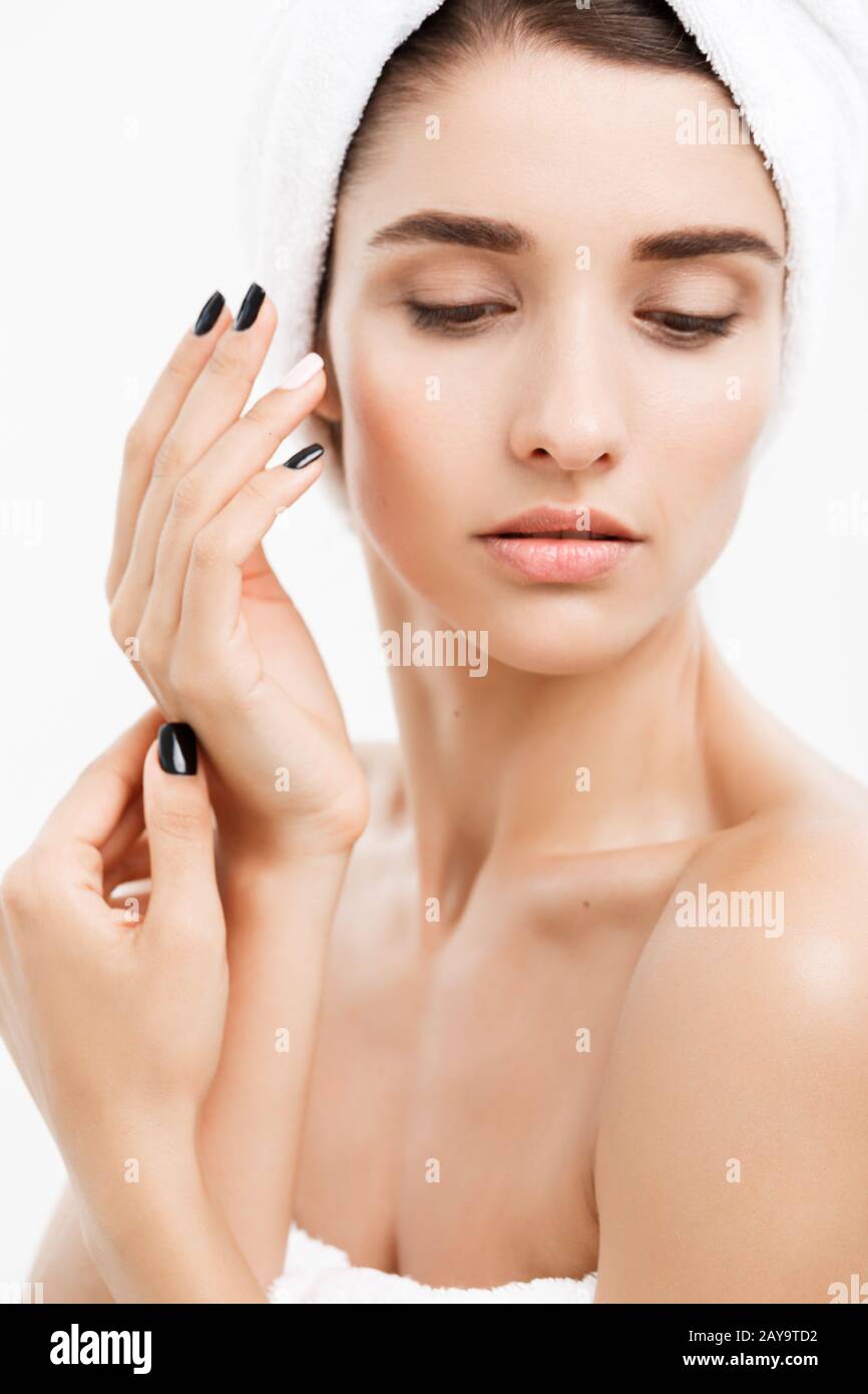 Beauty and Skin care concept - Close up Beautiful Young Woman touching ...