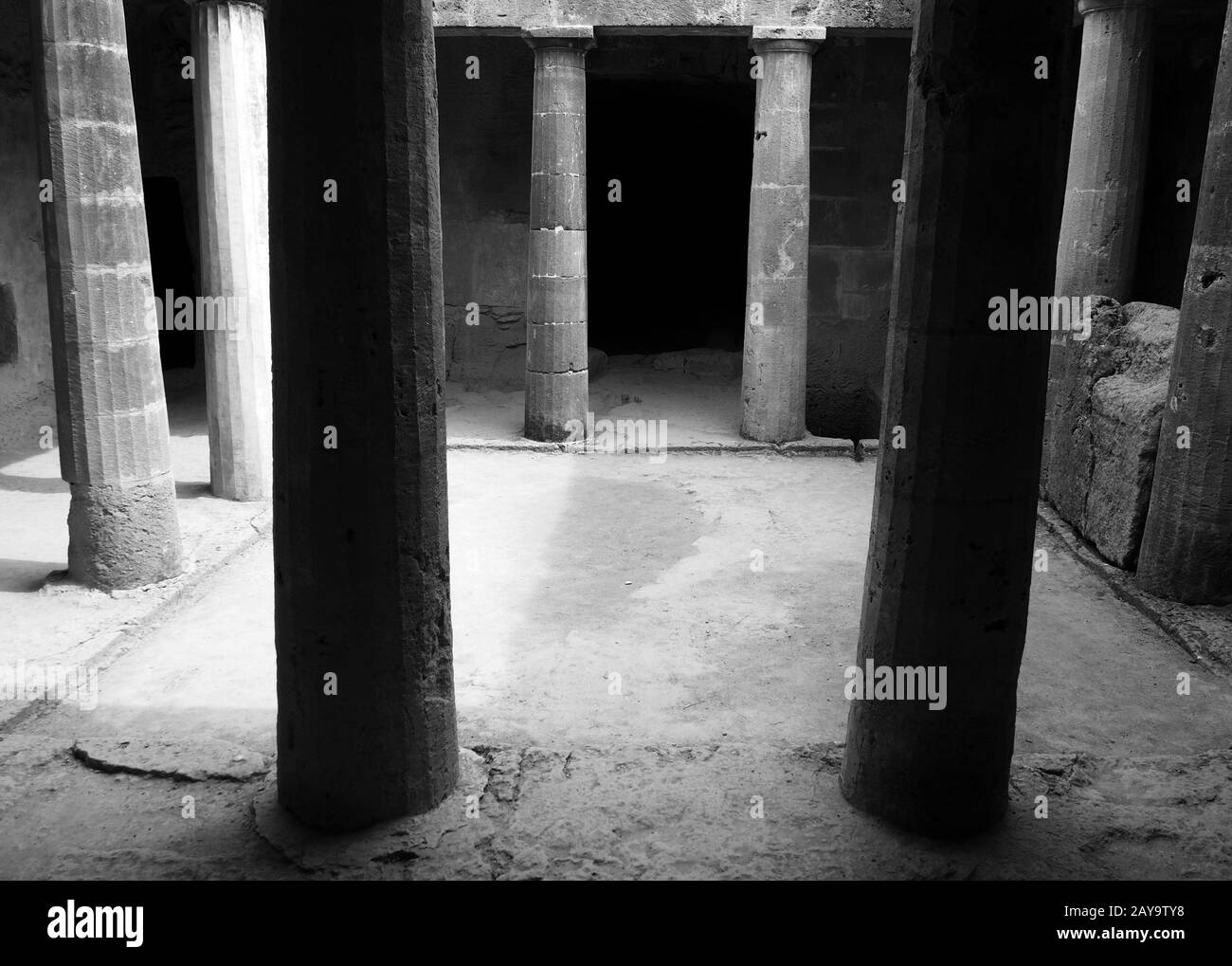 monochrome image of an underground chamber at the tombs of the kings in paphos cyprus Stock Photo